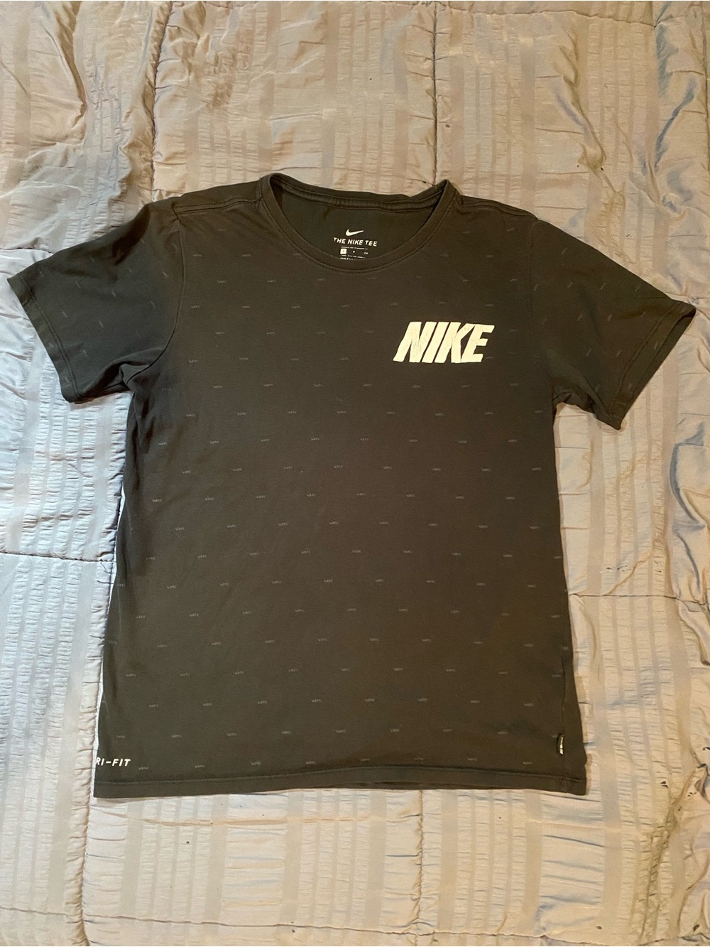 Nike Black Short-Sleeve Logo Tee with Subtle Pattern